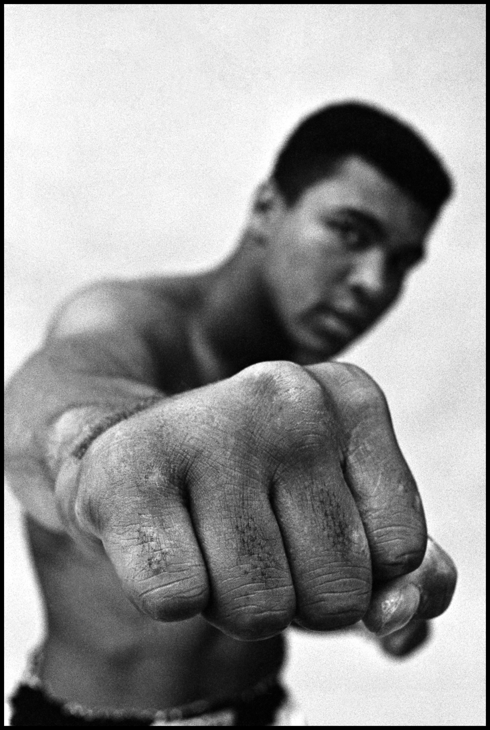 Thomas Hoepker, travelled to London on a photography assignment to meet the then unknown boxer, Muhammad Ali, he would have no idea how iconic and significant he would become. Even then Ali would walk the streets of London, “constantly talking about how wonderful he was: ‘I’m the greatest!’ And indeed he was.” Thomas Hoepker’s photograph Ali Right Fist, London, 1966 is one of the most famous photographs of Ali ever taken. This artwork will never be published again, and is exceedingly scarce.